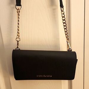 Black Michael Kors partial chain strap purse with detachable card/cash pouch